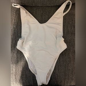 White one piece swim suit. Size: XS